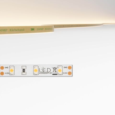 Artikelfolto eines einfarbigen LED Streifens mit 12V Betriebsspannung und technischer Zeichnung drüber