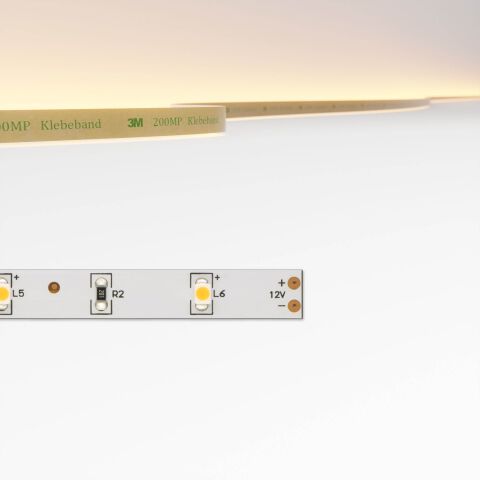 Produktfoto sparsamer LED Streifen mit 10cm Modullänge mit blanken Lötkontakten als Anschlussart. Die warmweiße Leuchtfarbe ist oben im Bild zu sehen
