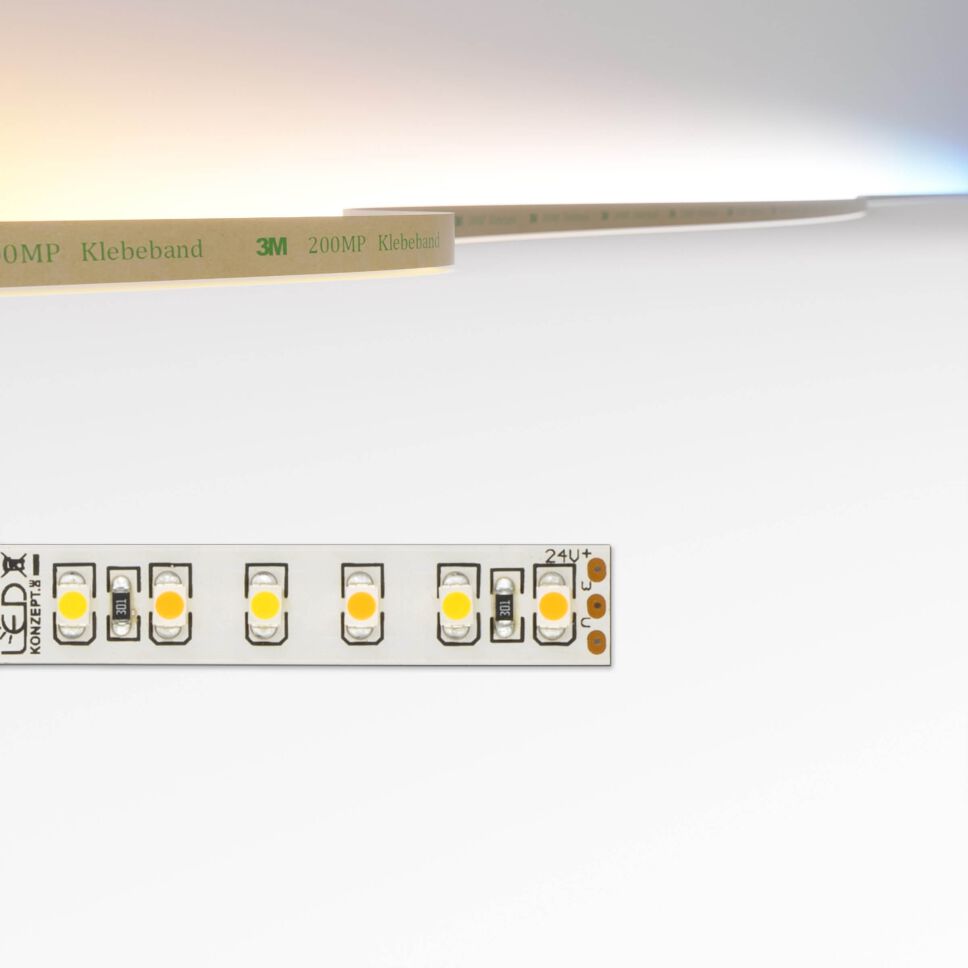 CCT LED Streifen, dicht bestückt, 10mm breit mit weißer Oberflächen und blanken Lötaugen. Oben im Bild ist die Lichtfarbe dargestellt
